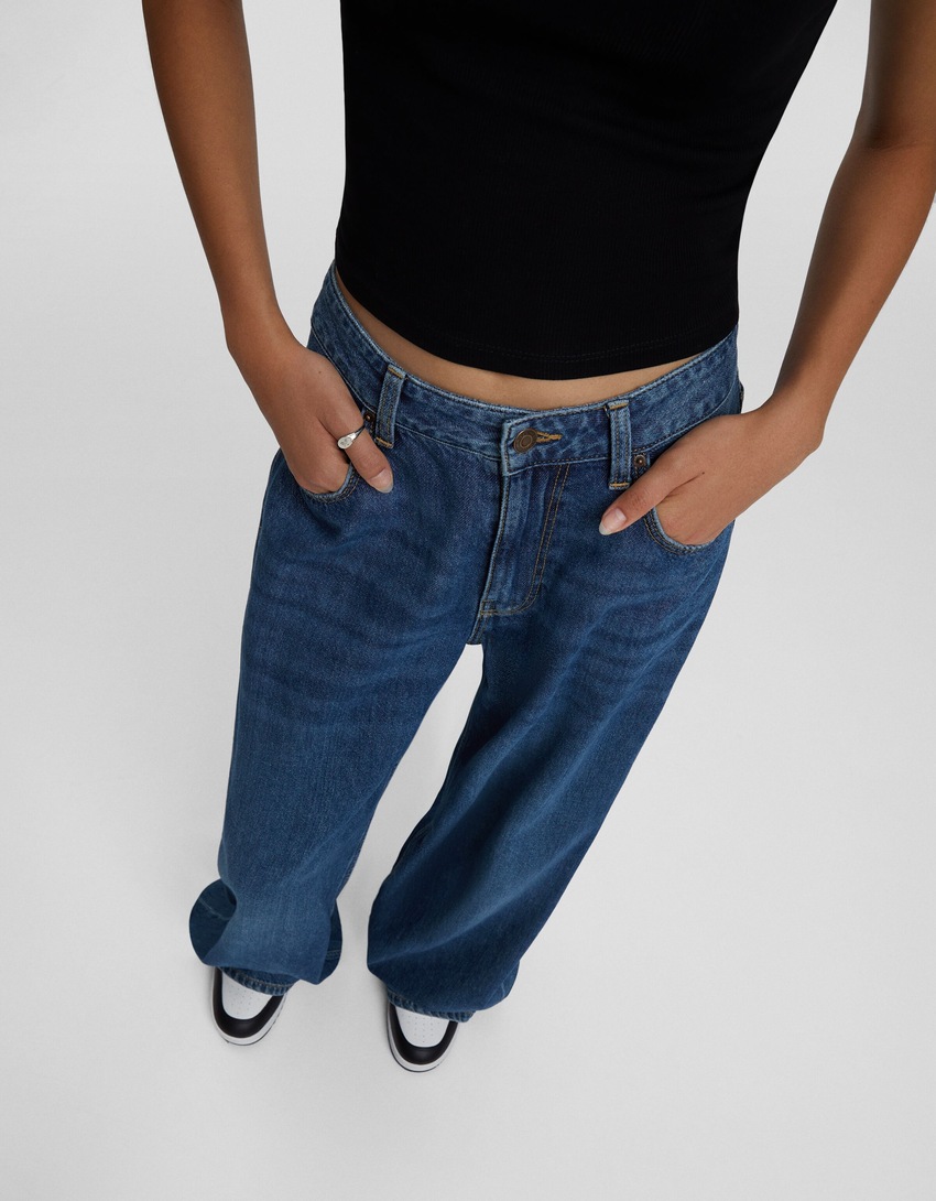 calça jeans de perna larga