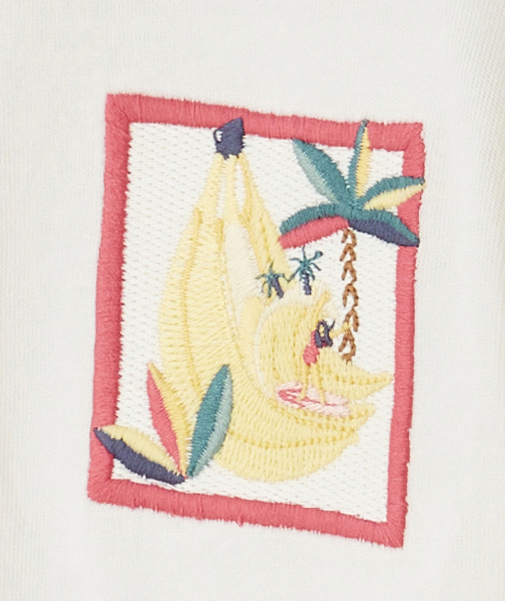 T-SHIRT ANTI-UV BÉBÉ FILLE EN COTON BIO ÉCRU AVEC BRODERIE ET VOLANTS