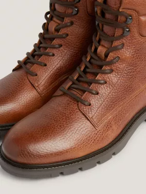 Botas de cano médio em couro com forro quente
