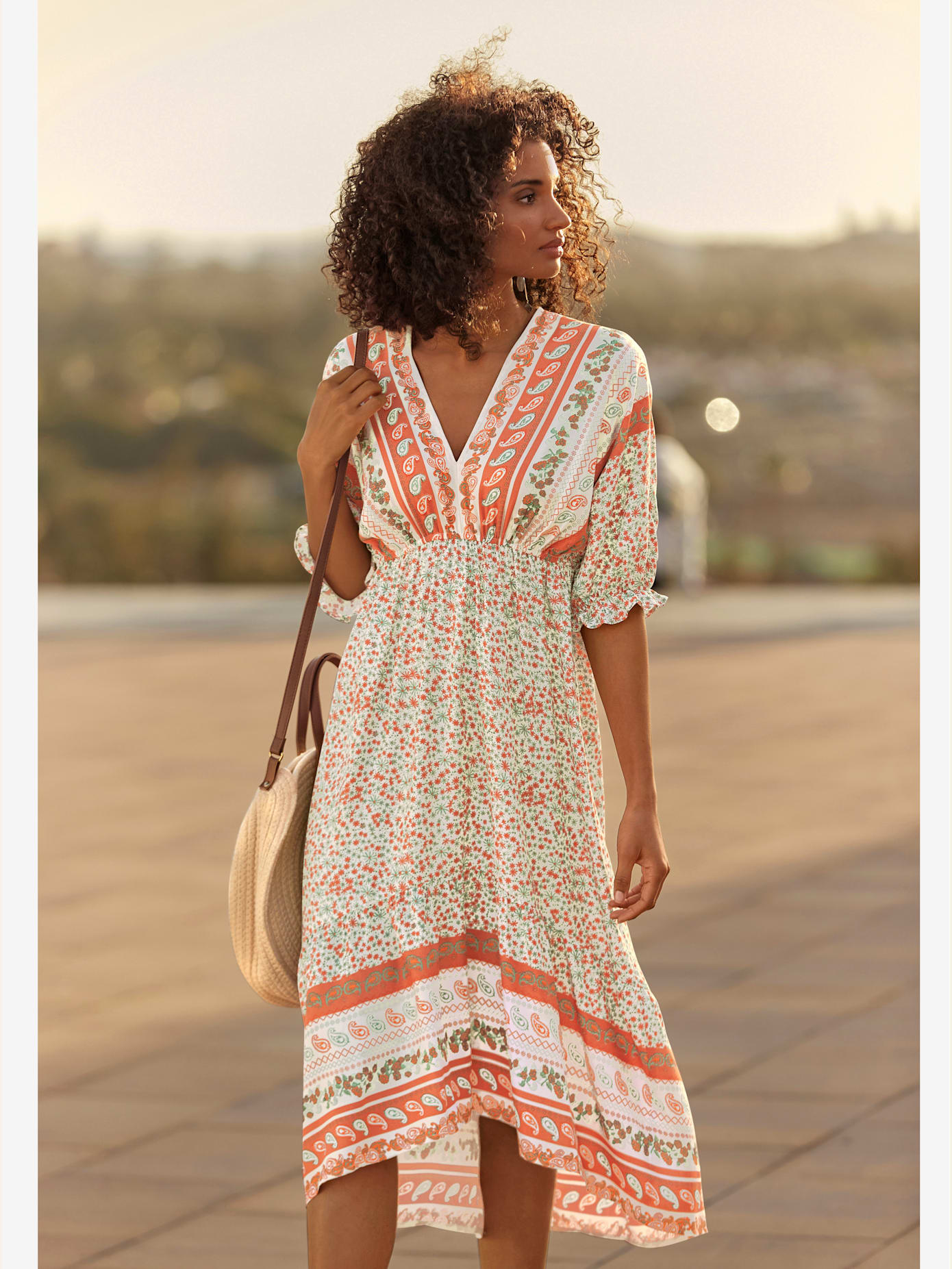 Robe coupe plus longue au dos