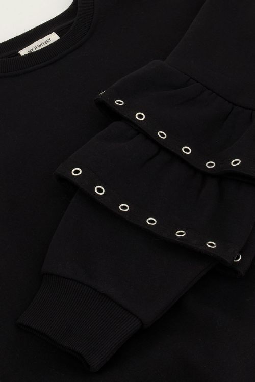 Zwarte sweater met ruffle mouwen & studs