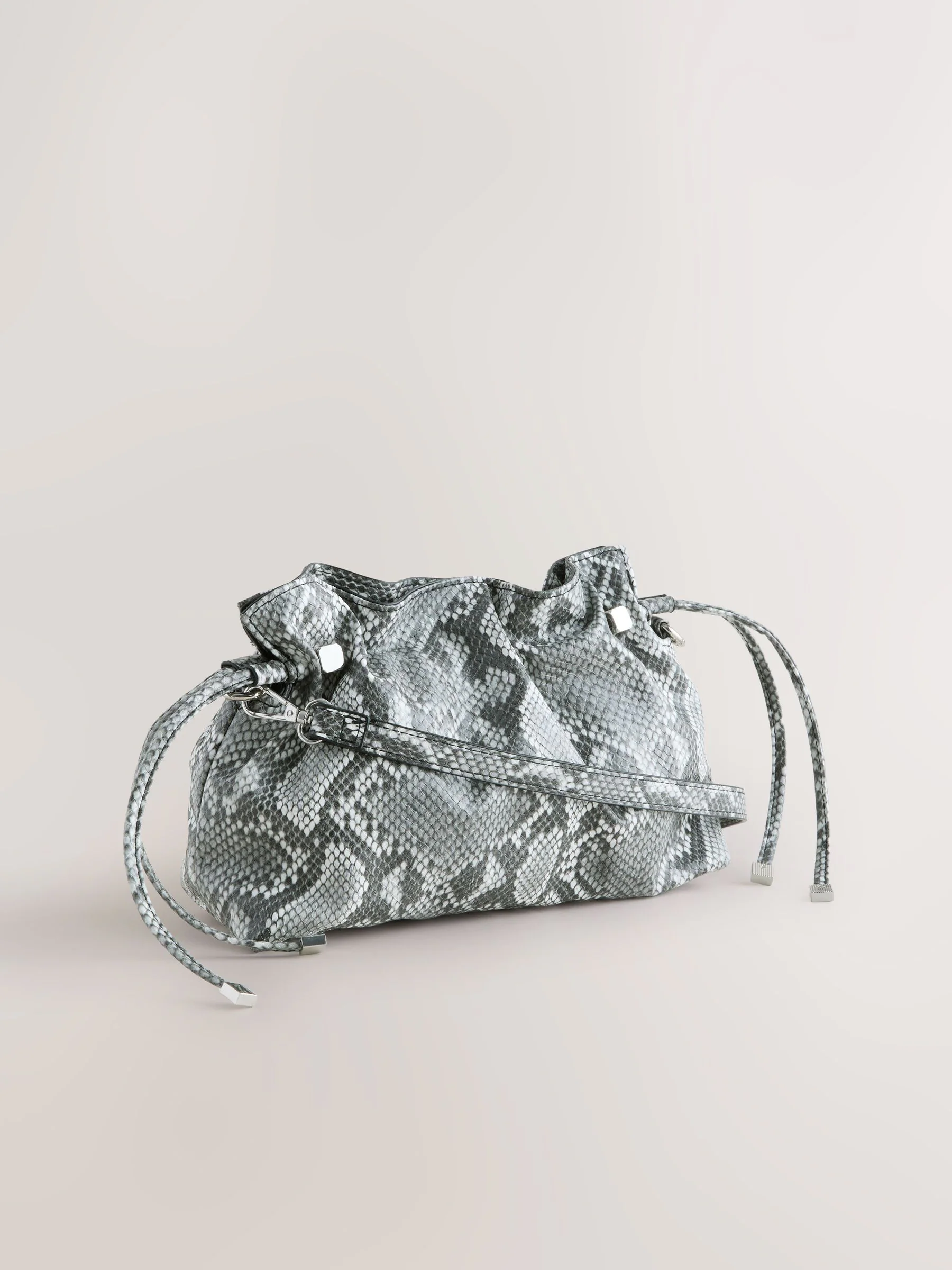Slangenprint - Clutch met ruches