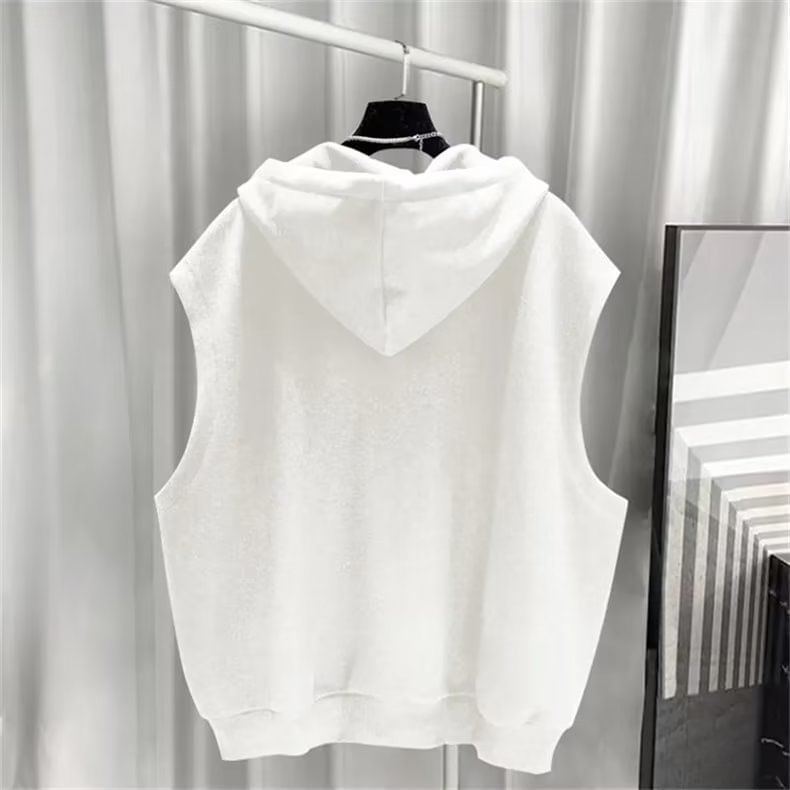 Femilina - Effen vest met ritsdetail en capuchon