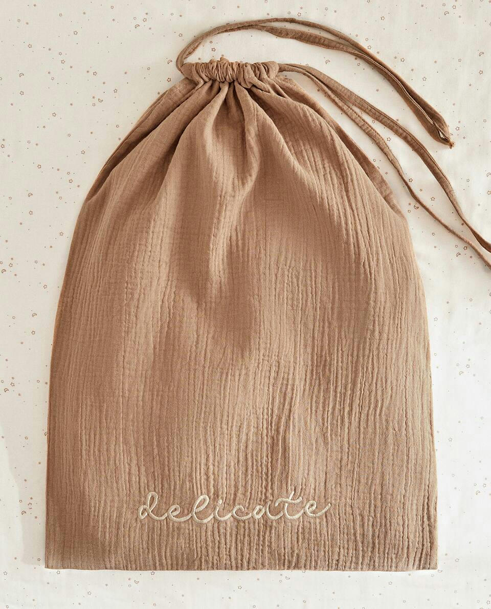 SACO DE ROUPA GRANDE COM ESTAMPA DE ESTRELA