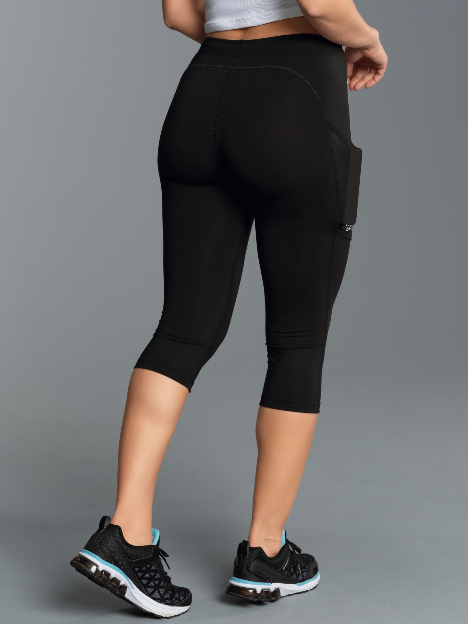 Kurze Sportleggings mit SeitentascheSchwarz