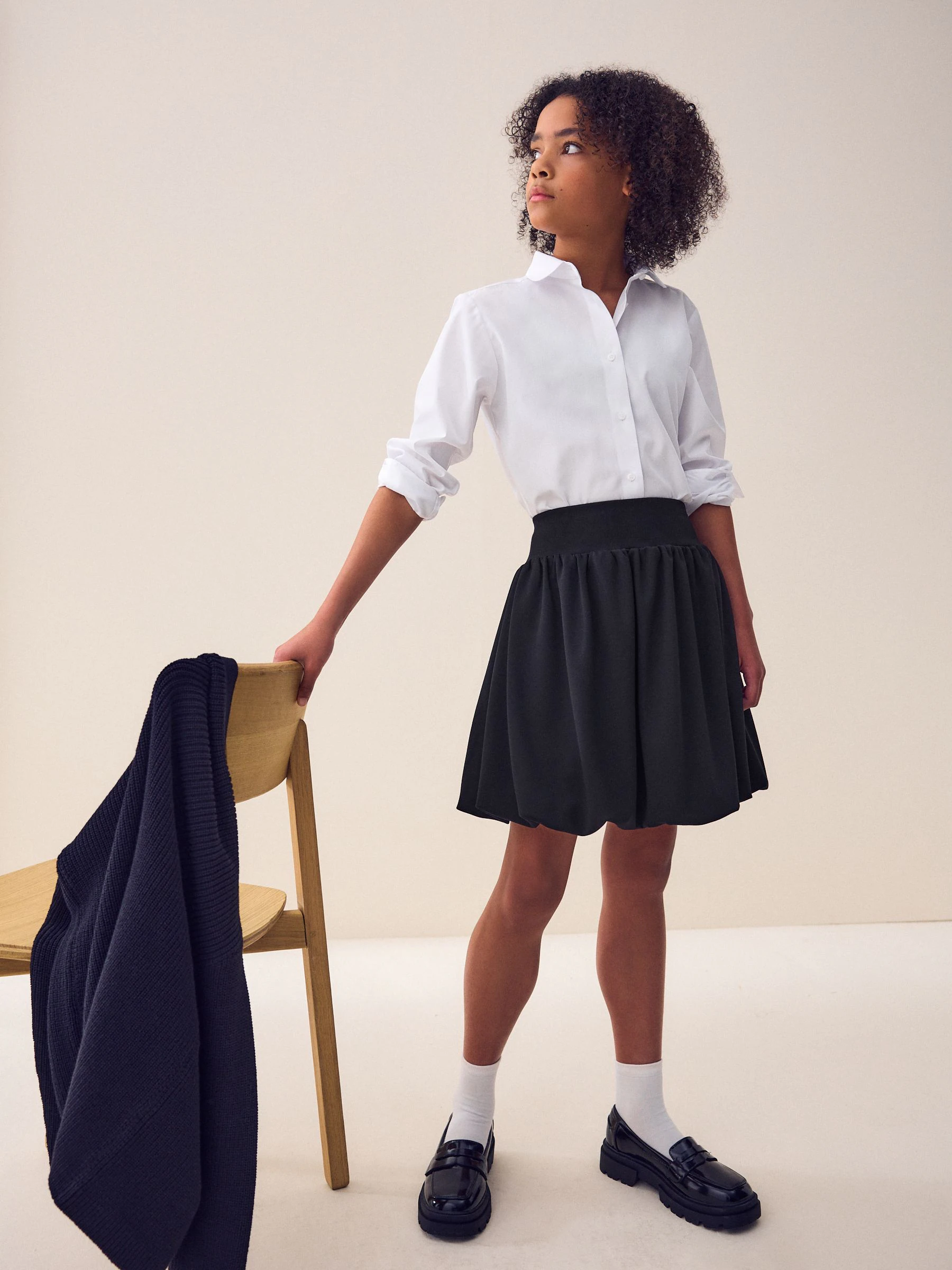 Zwart - Jersey stretch rok met ballonzoom en elastische taille (3-17jr)