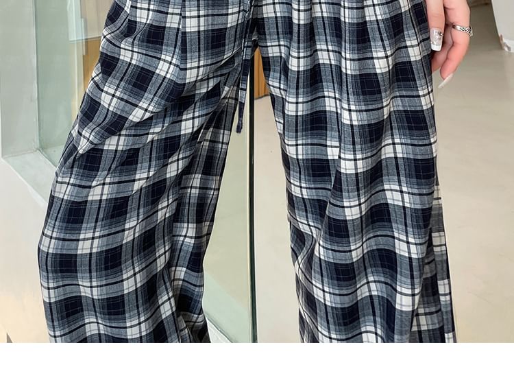Tel tot 10 - Broek met trekkoord in de taille, geruite kant en wijde pijpen (verschillende ontwerpen)