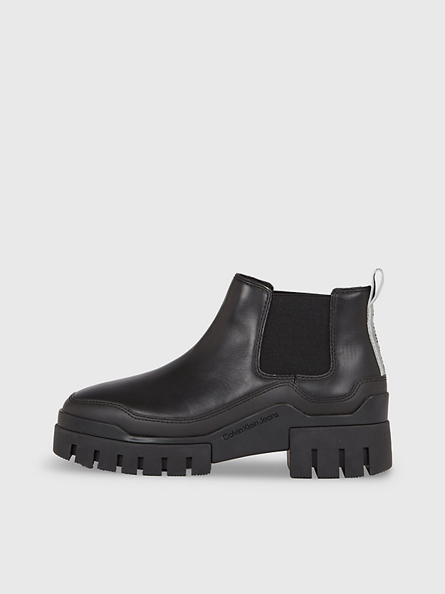 botas de couro até o tornozelo