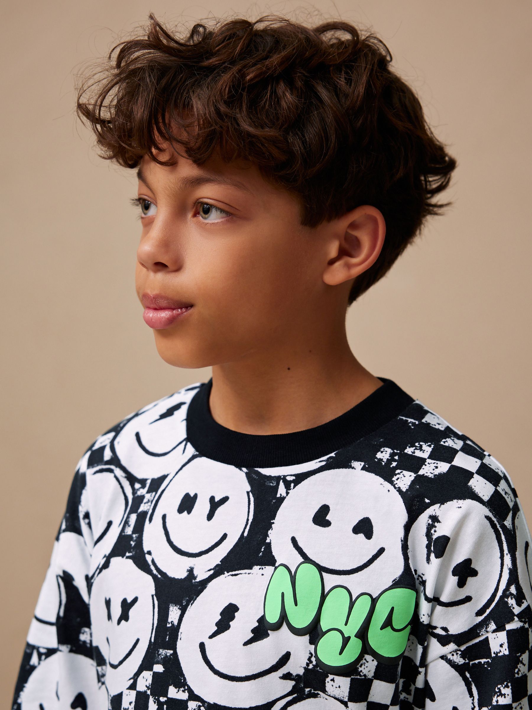 Zwart/wit met dambordpatroon - Set van ruimvallend T-shirt met korte mouwen en shorts (3 - 16 jr)