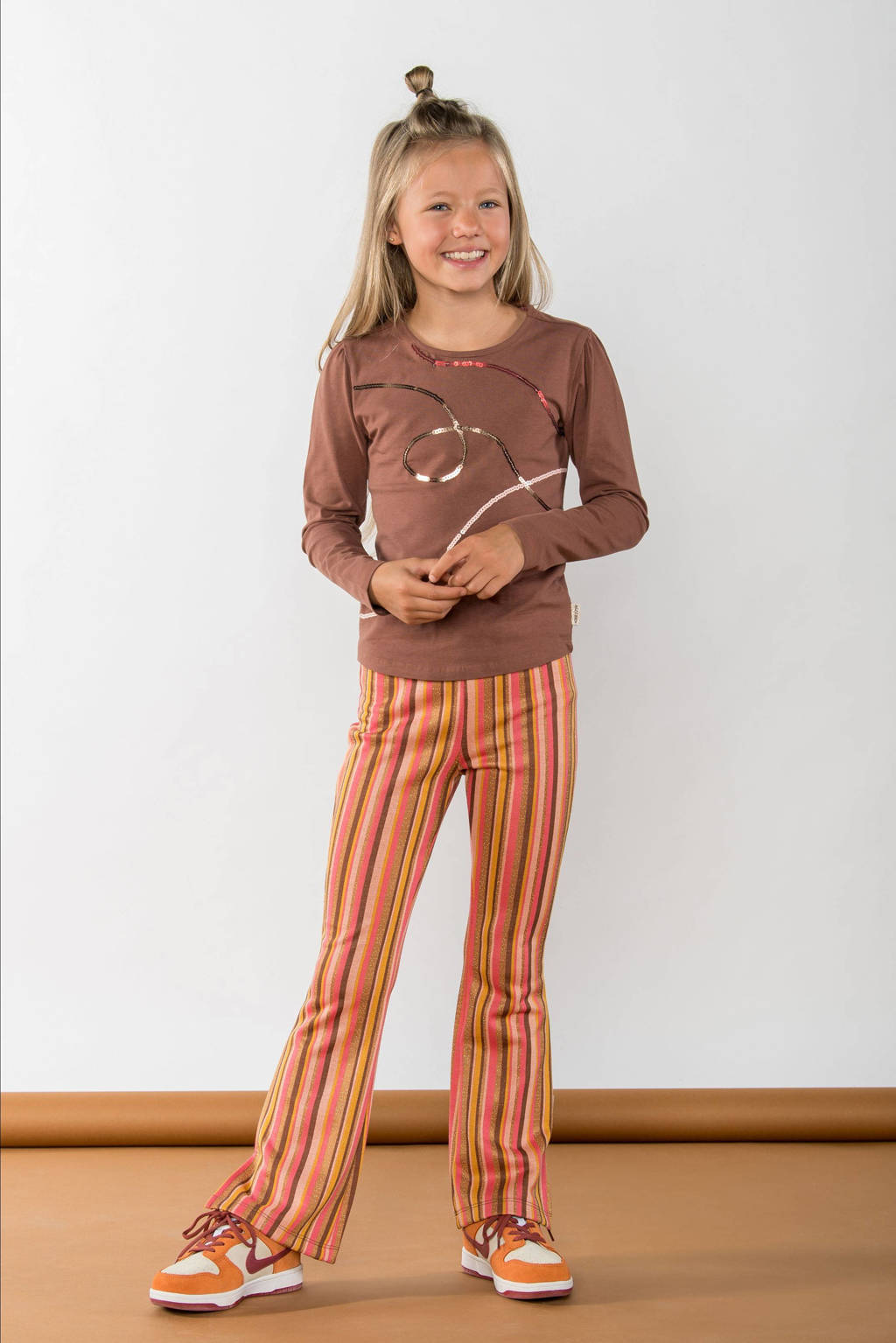 B.Nosy gestreepte flared broek Phae oranje/roze
