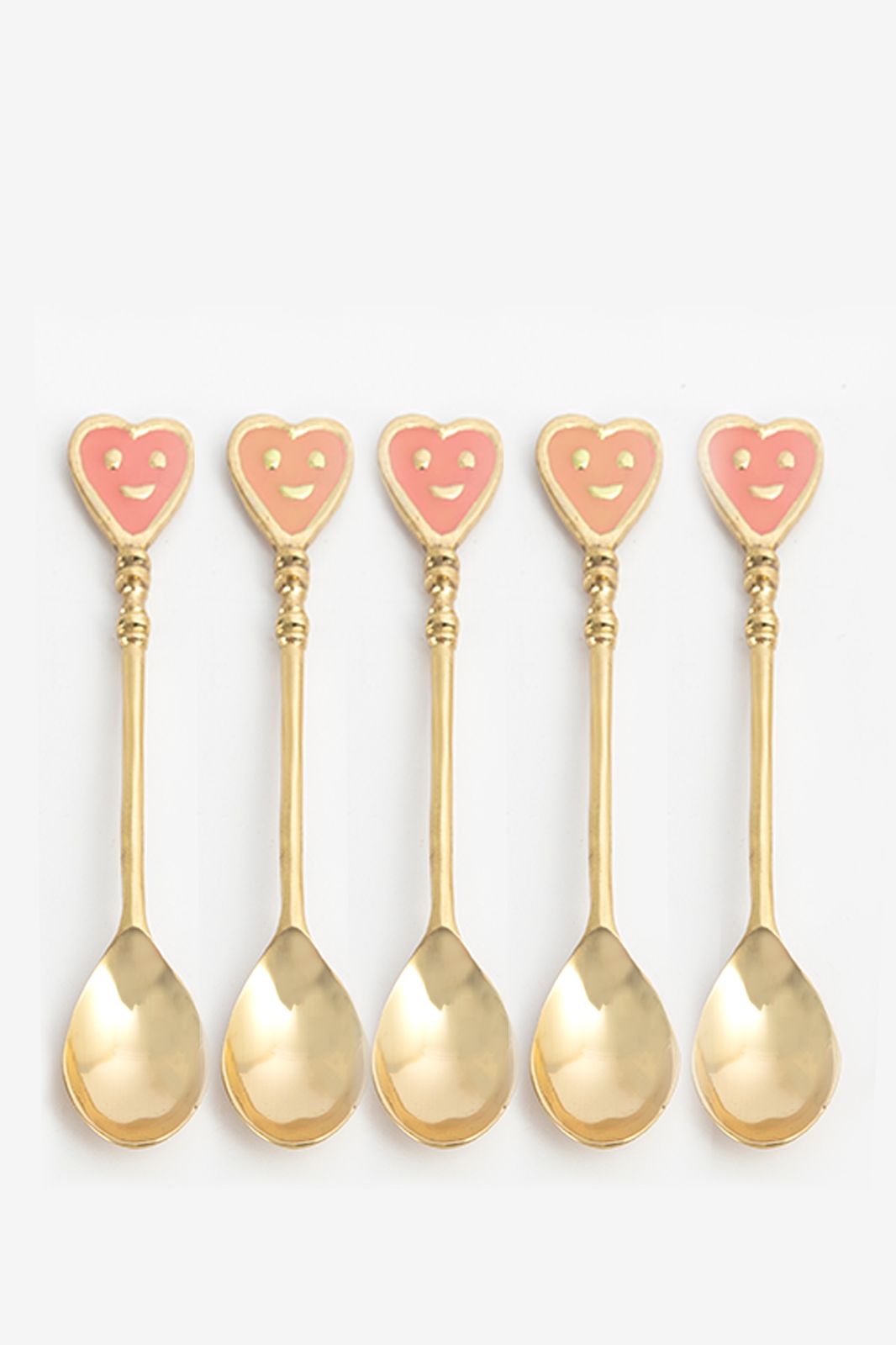Roze en goudkleurige theelepels smiley hartjes