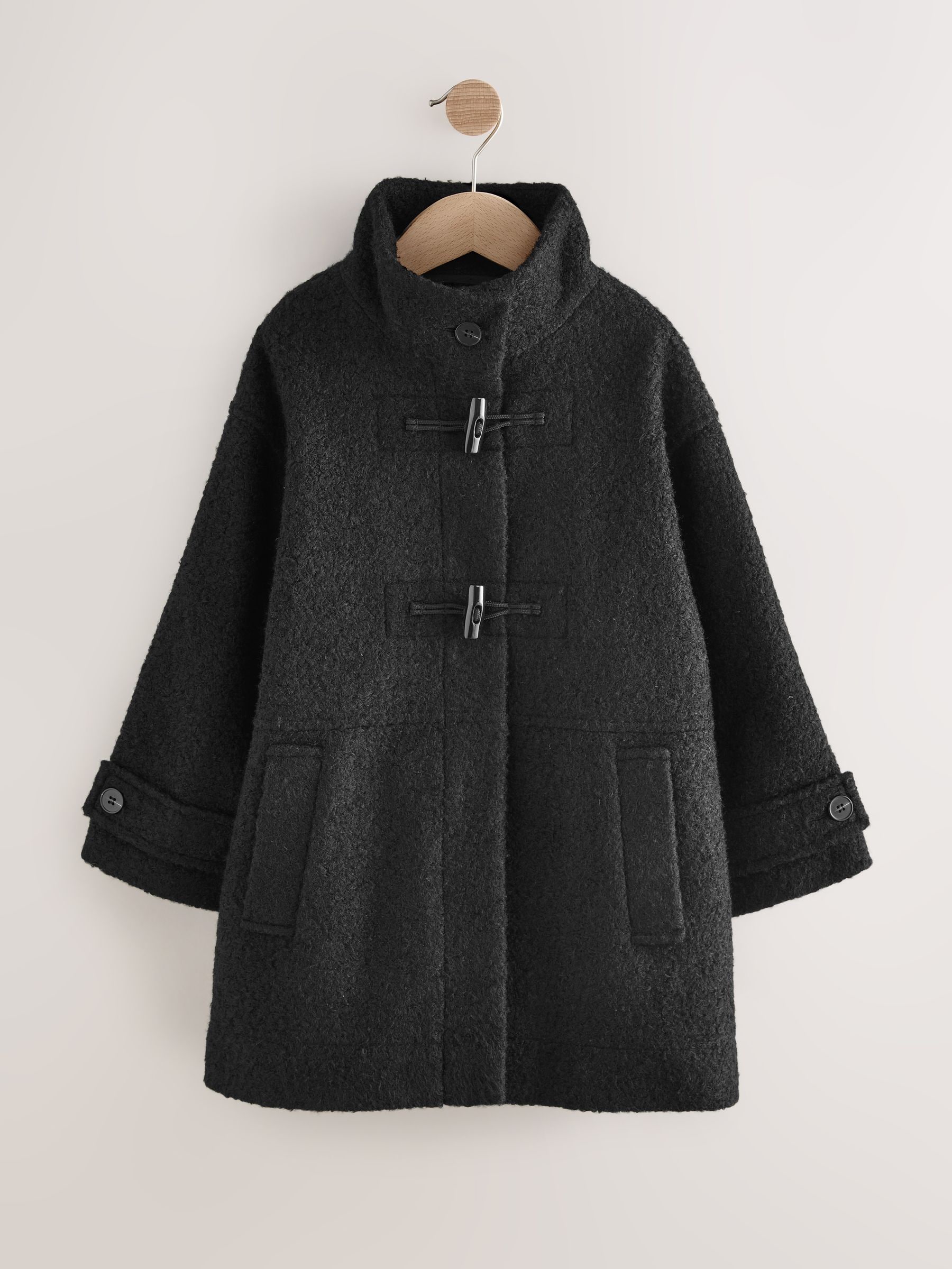 Zwart - Ruimvallende duffelcoat (3-16jr)