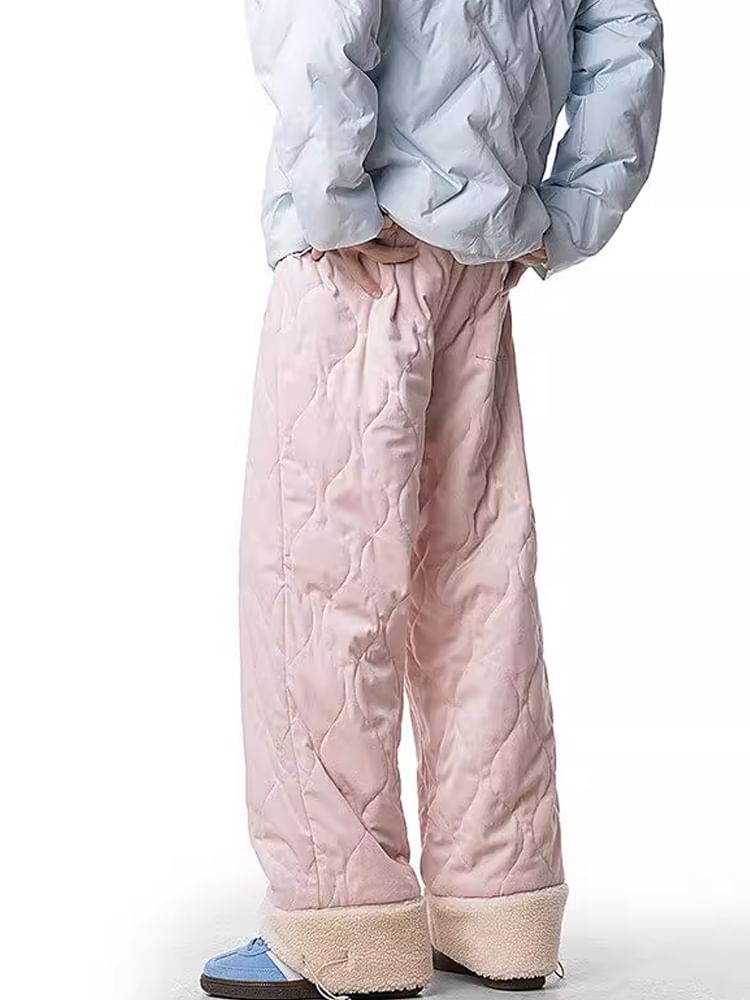Kimeya - Wijde broek met middelhoge taille en imitatiebontprint en hondenprint
