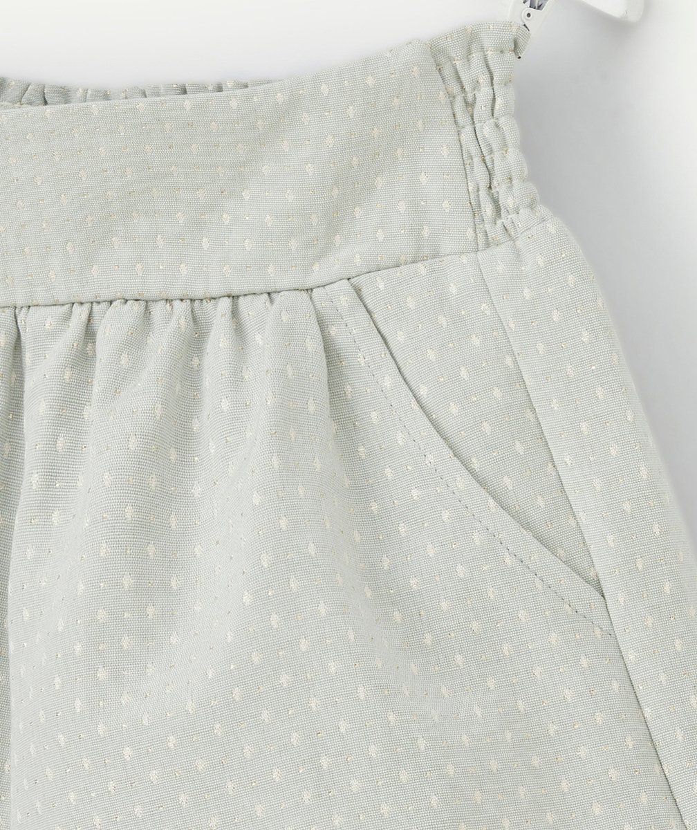 SHORT FILLE VERT AVEC SURPIQÛRES COULEUR DORÉE