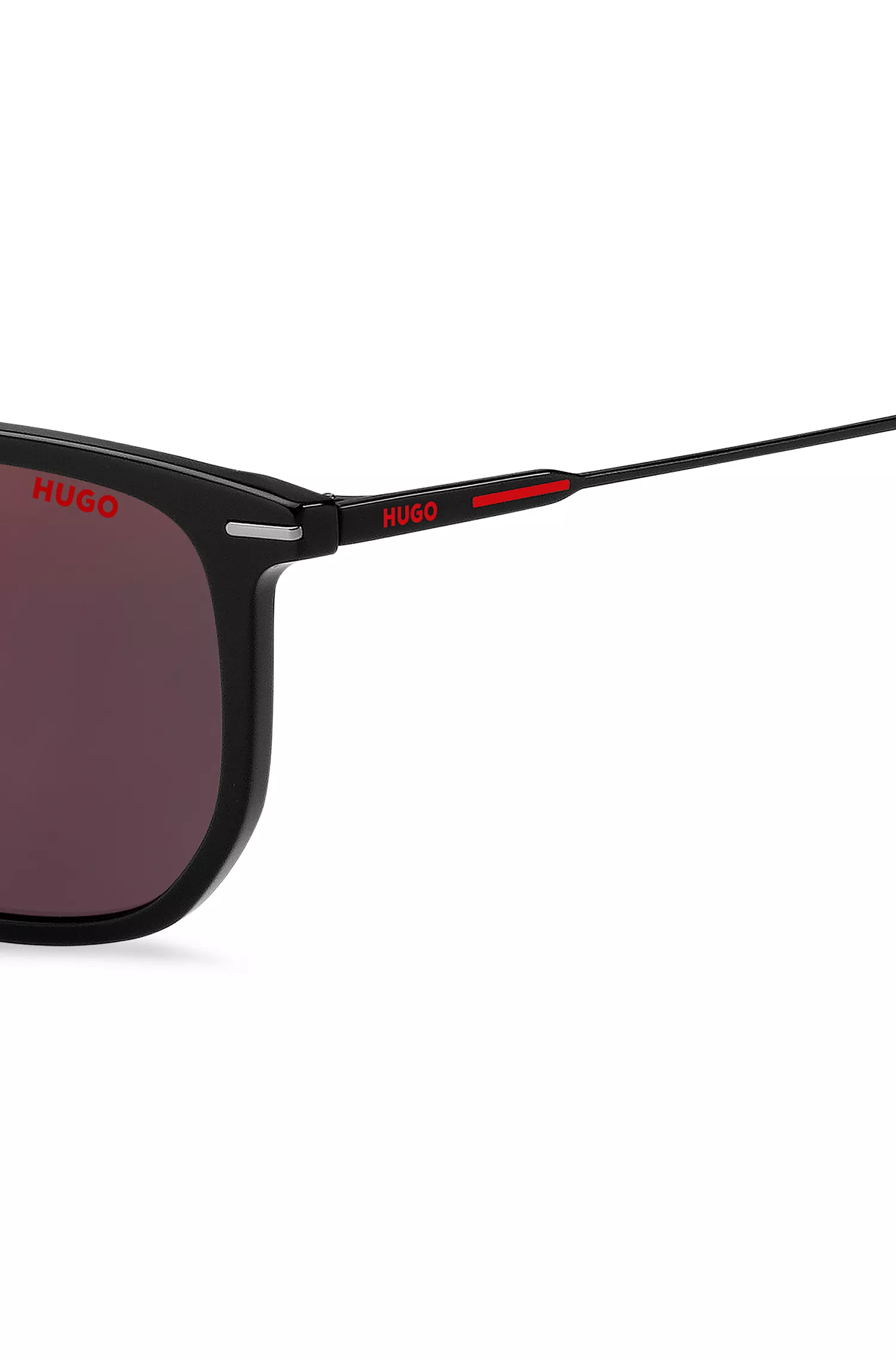 Óculos de sol HUGO em acetato vermelho e preto com detalhes em vermelho.