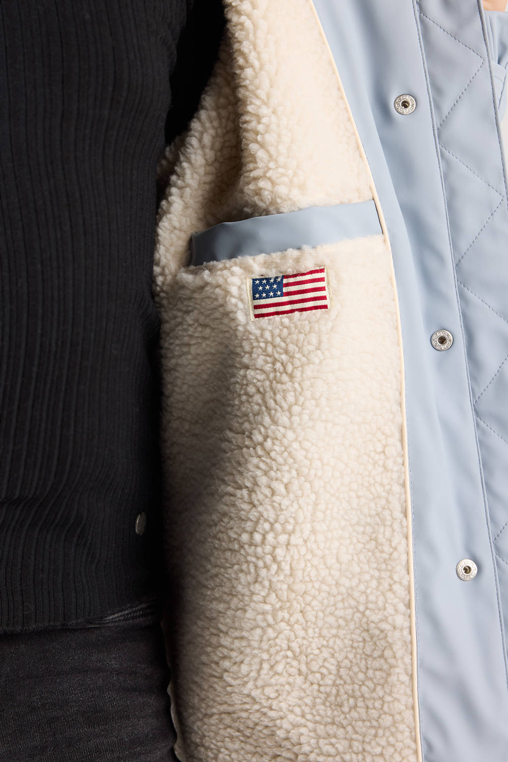 America Today regenjas babyblauw