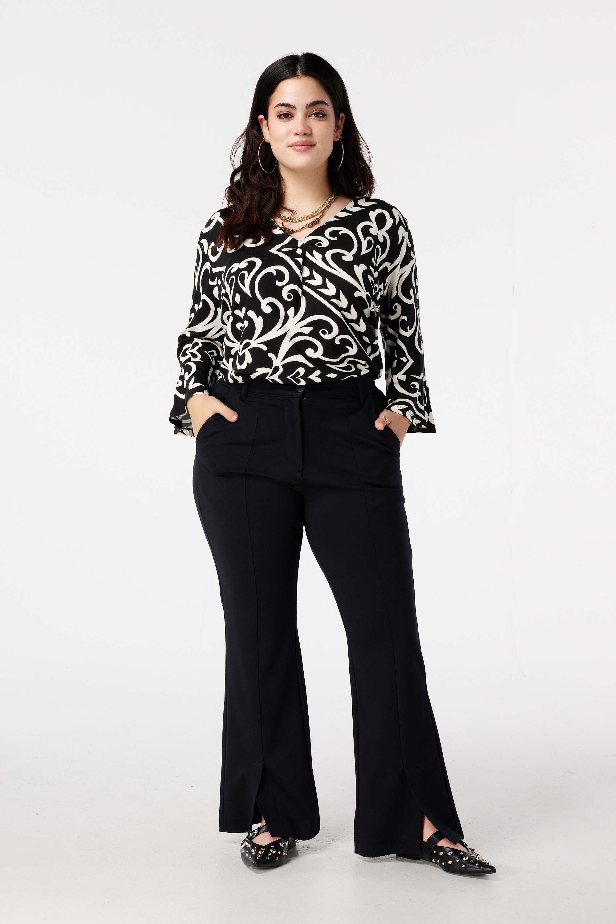Flared pantalon met split Zwart