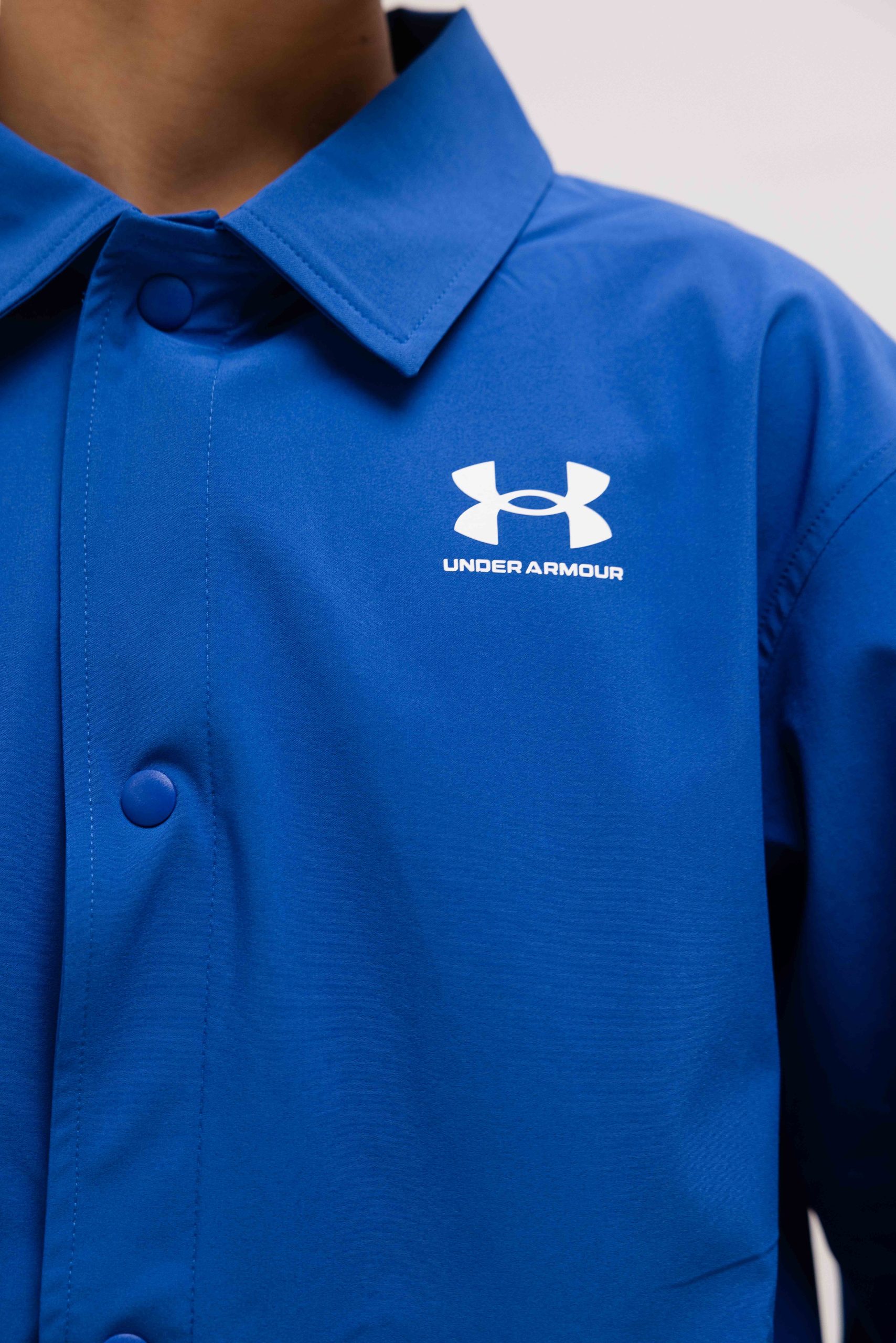 Under Armour Woven Coach Jack Kids Blauw