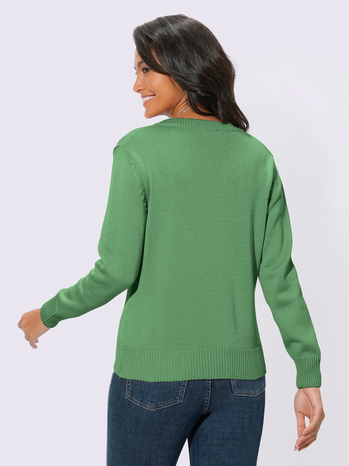 Pull femme coupe classique col en v finitions côtelées