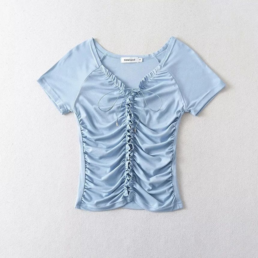 Asiris - Crop top met korte mouwen, V-hals, effen, geplooide rand en vetersluiting, slim fit