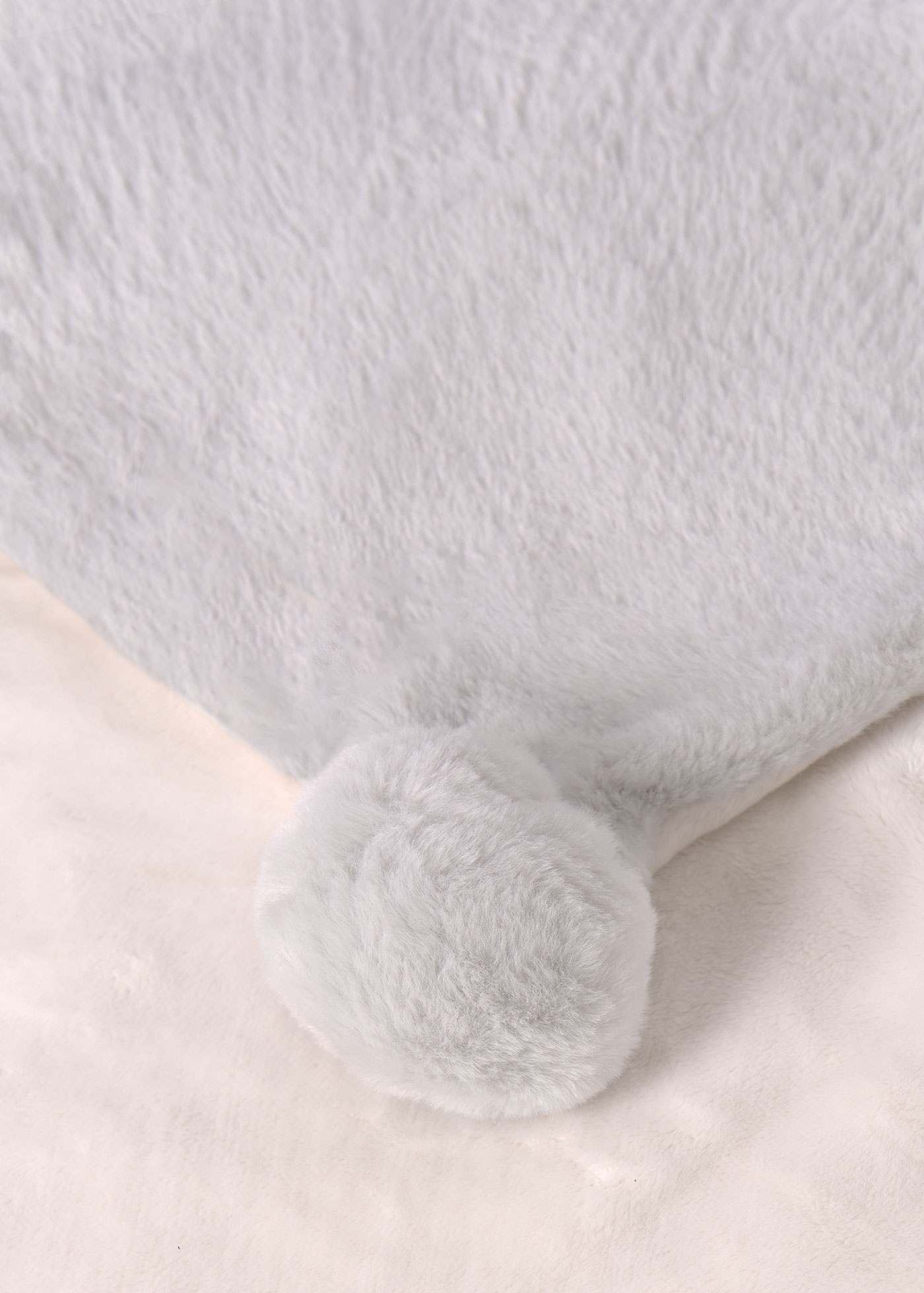 manta de bebê com pompons