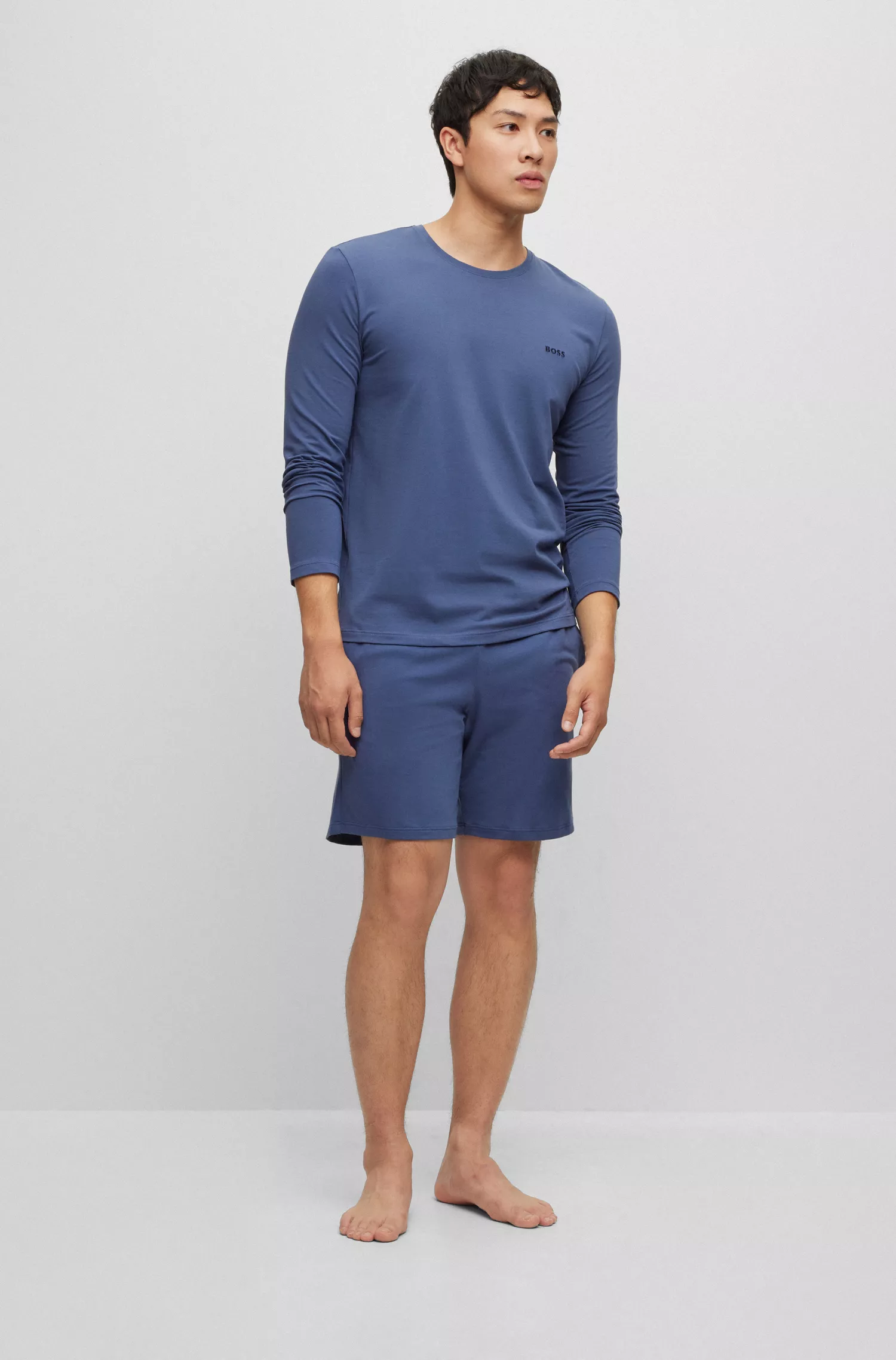 Camiseta de descanso BOSS com logo preto bordado, em malha de algodão stretch.
