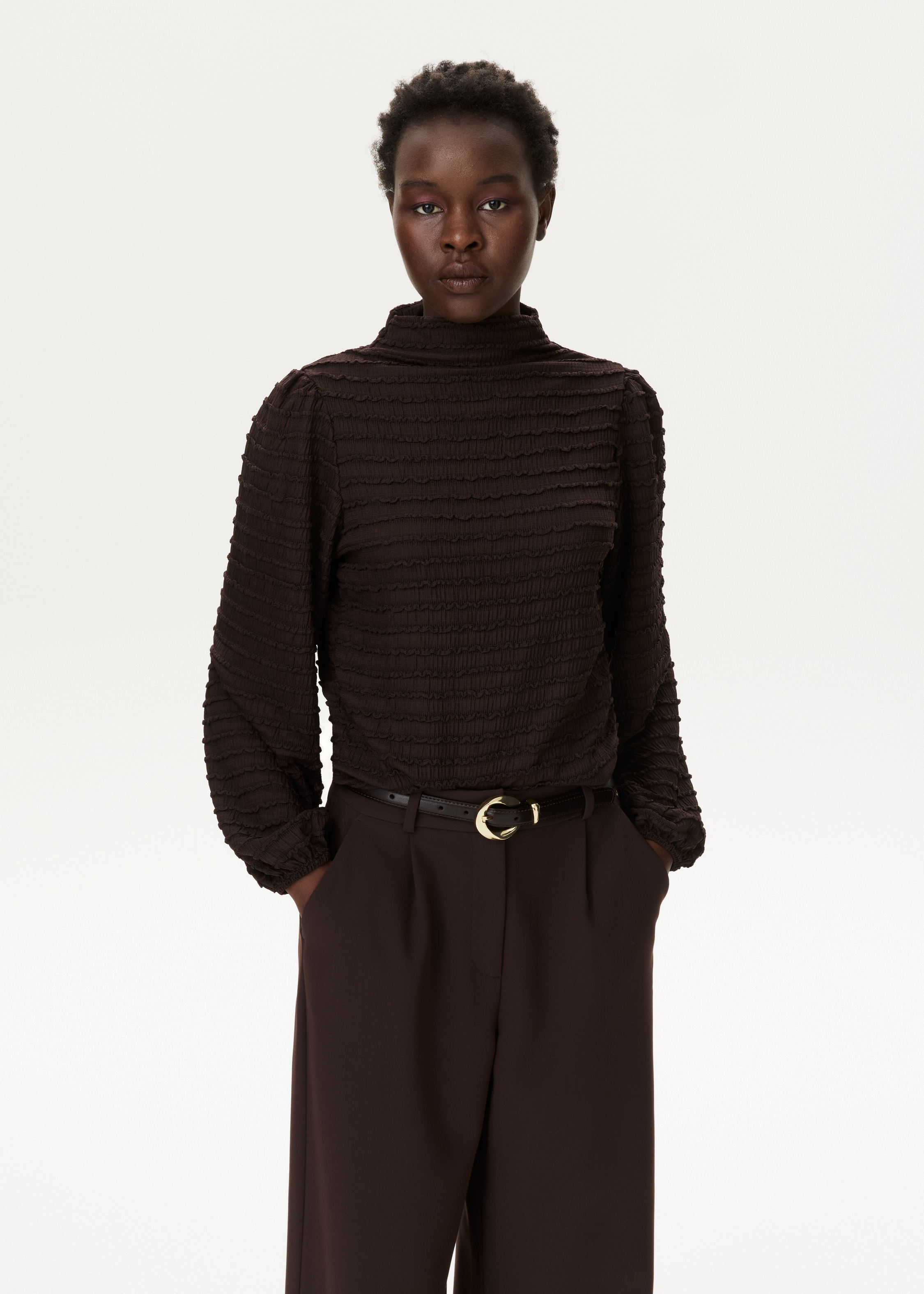 Top met ruffle structuur