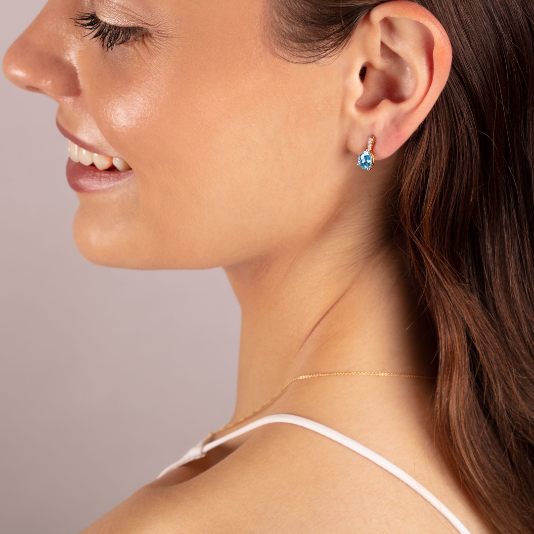 Ohrstecker 750/18 K Gelbgold mit Blautopas Tropfen und Diamanten 0.02 ct H/si