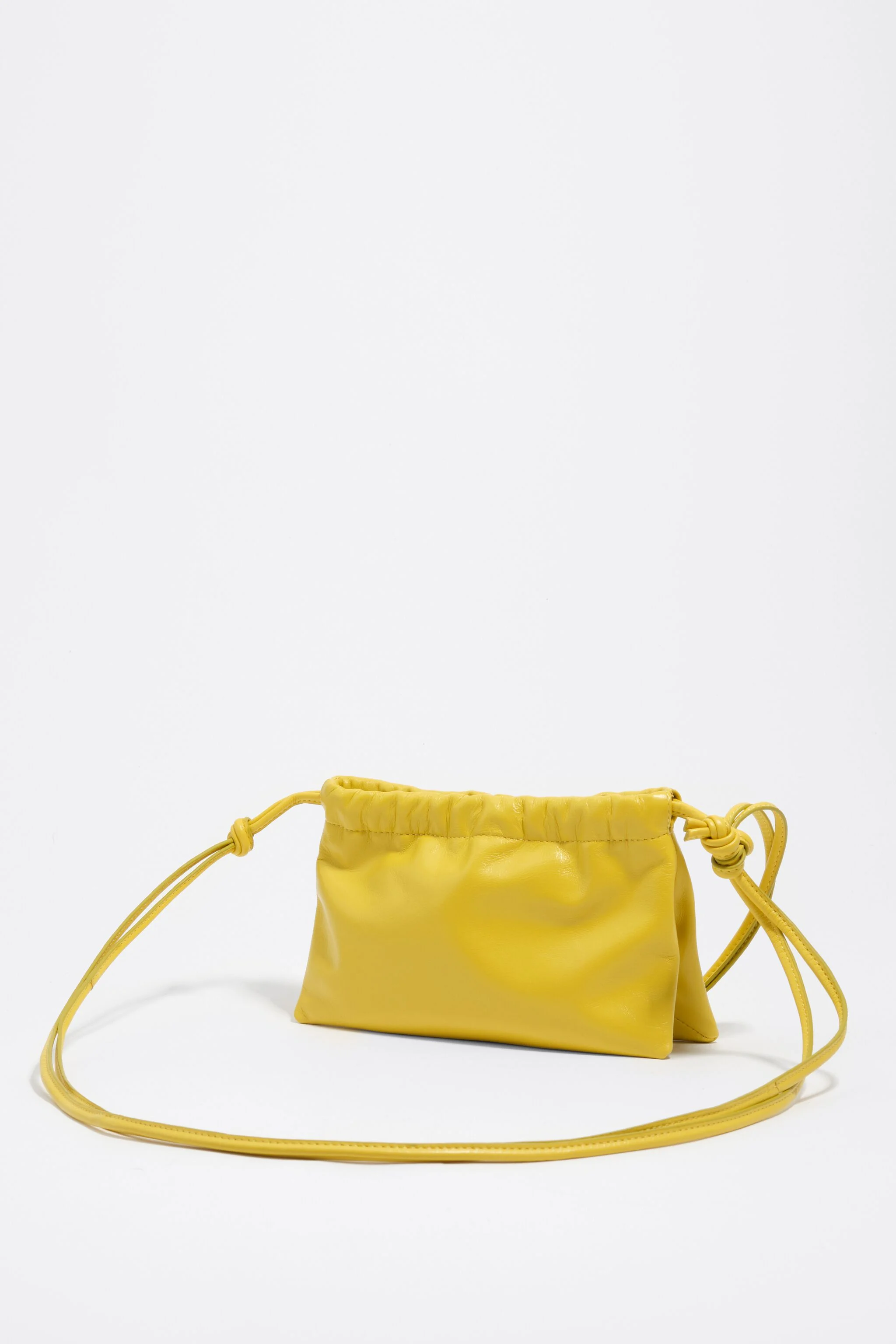 Mini bolsa de mão de couro amarelo