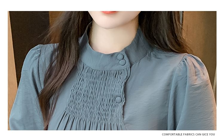 Bornite - Blouse met lange mouwen en geplooide hals en smokwerk