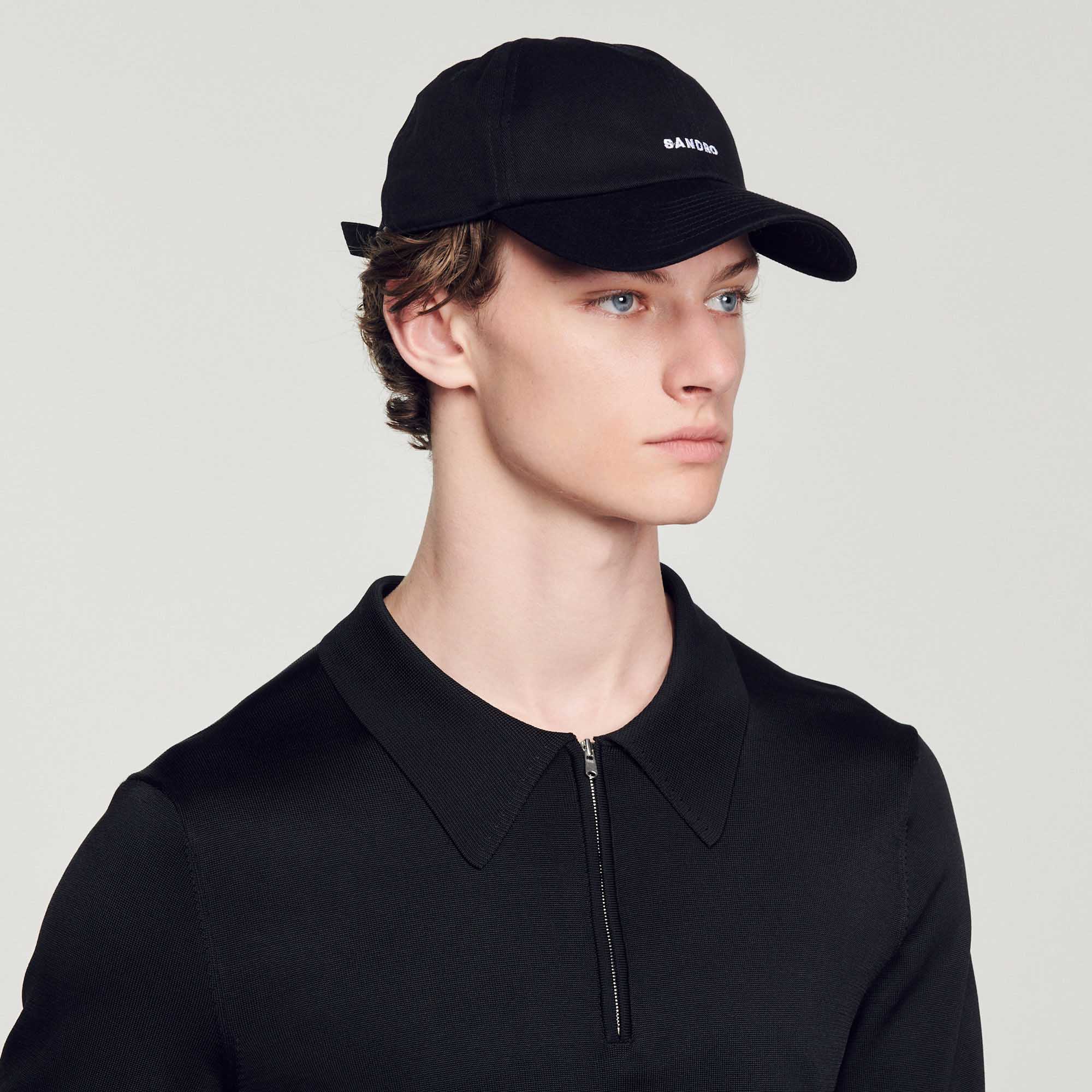 Polo en maille á col zippe
