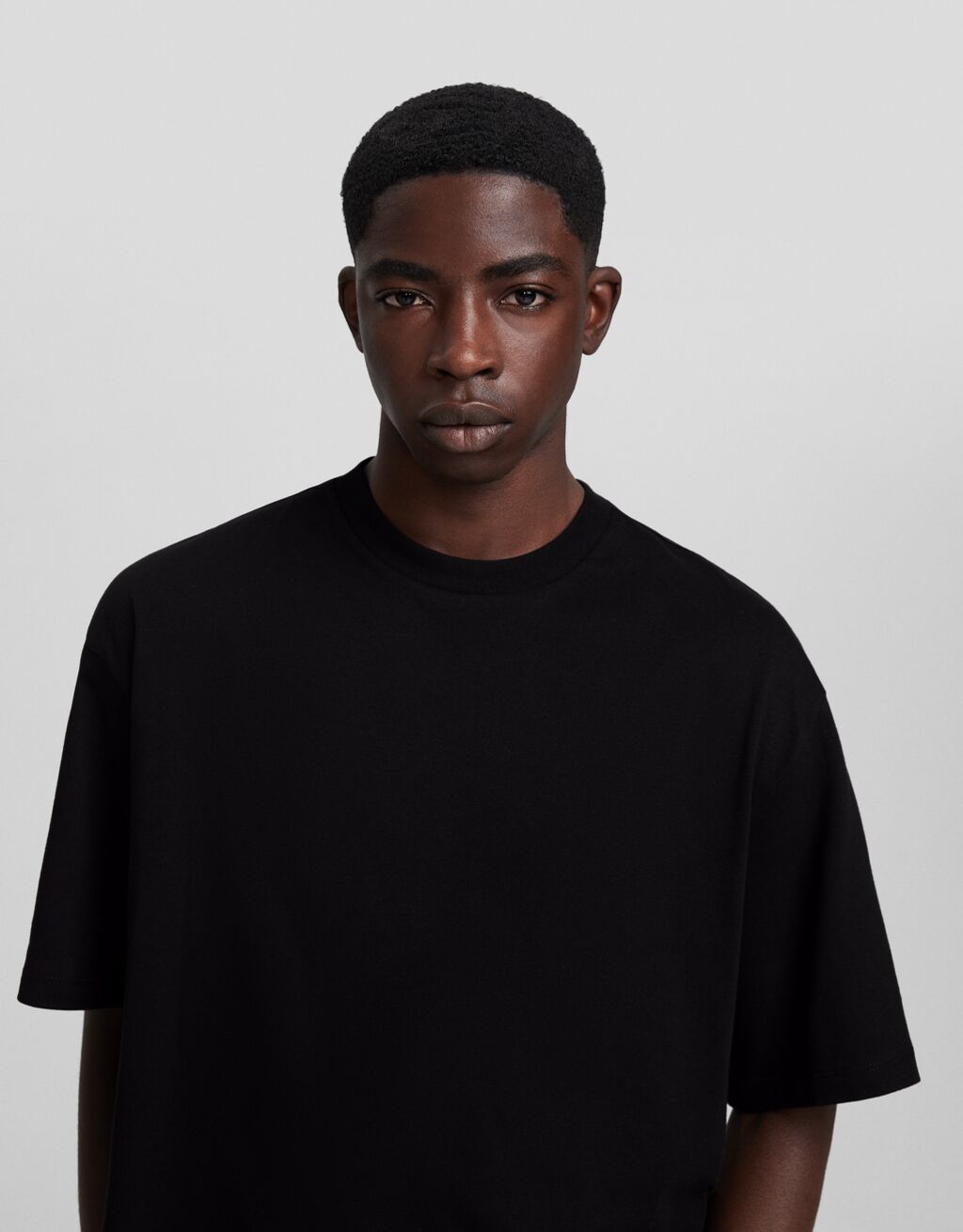 Camiseta de manga curta com modelagem quadrada