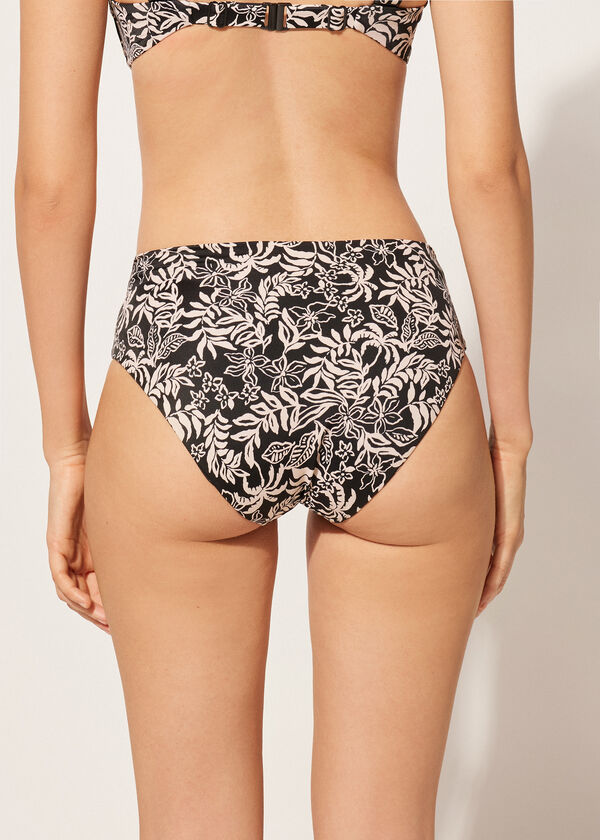 Calcinha de biquíni de cintura alta modeladora com estampa botânica em preto e branco.