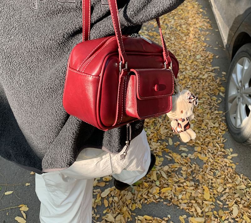 Letheroni - Crossbodytas met gesp en imitatieleren letters