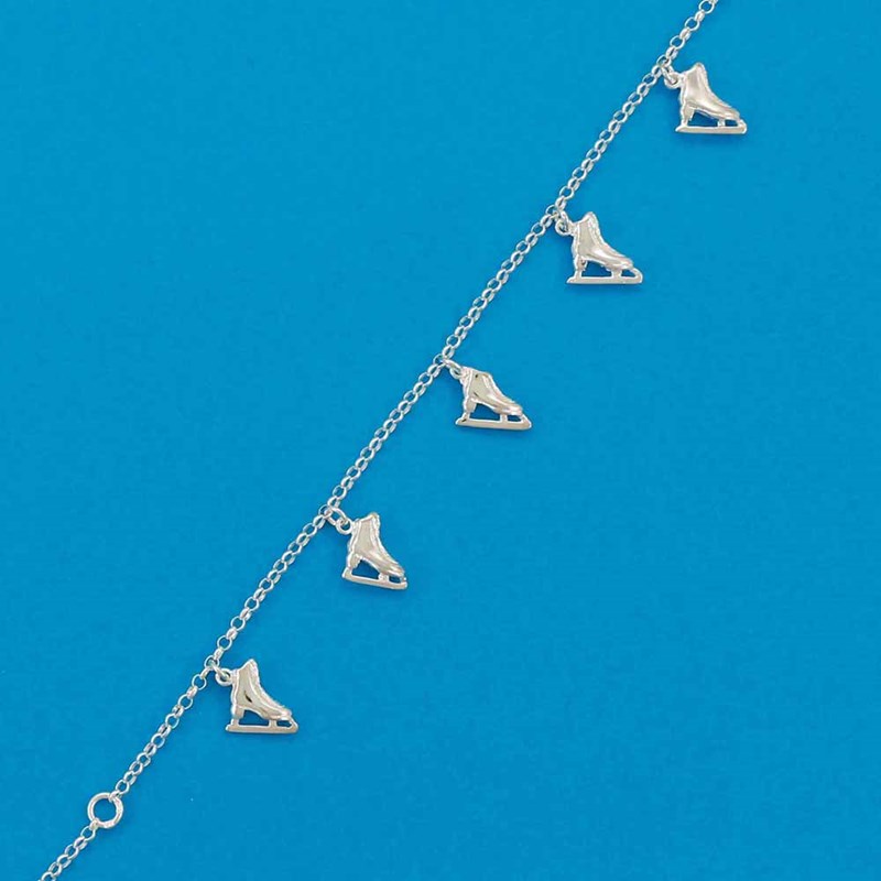 Bracelet patinage cinq breloques - Argent massif