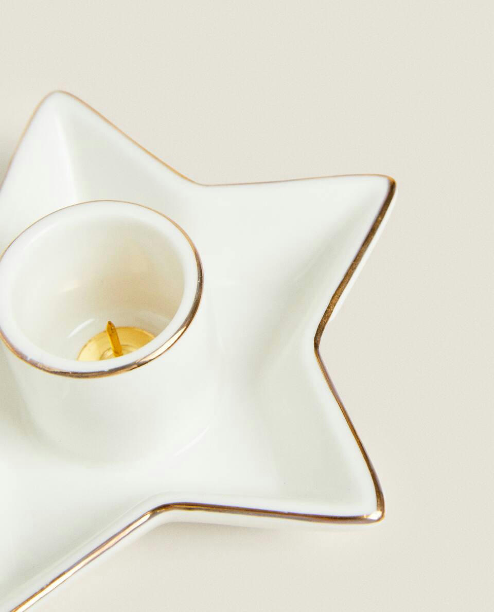 Castiçal médio em formato de estrela de Natal com borda