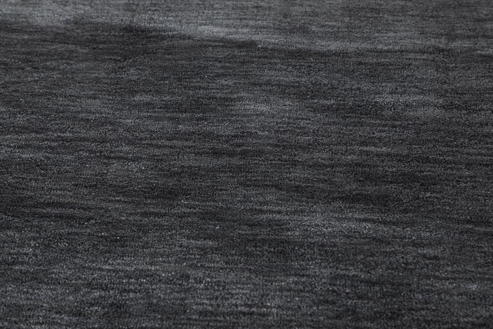 Wilston gulvteppe 160x230 160x230cm. Gråfarget polyester håndtuftet.