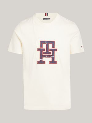 Camiseta com monograma TH da coleção de 1985