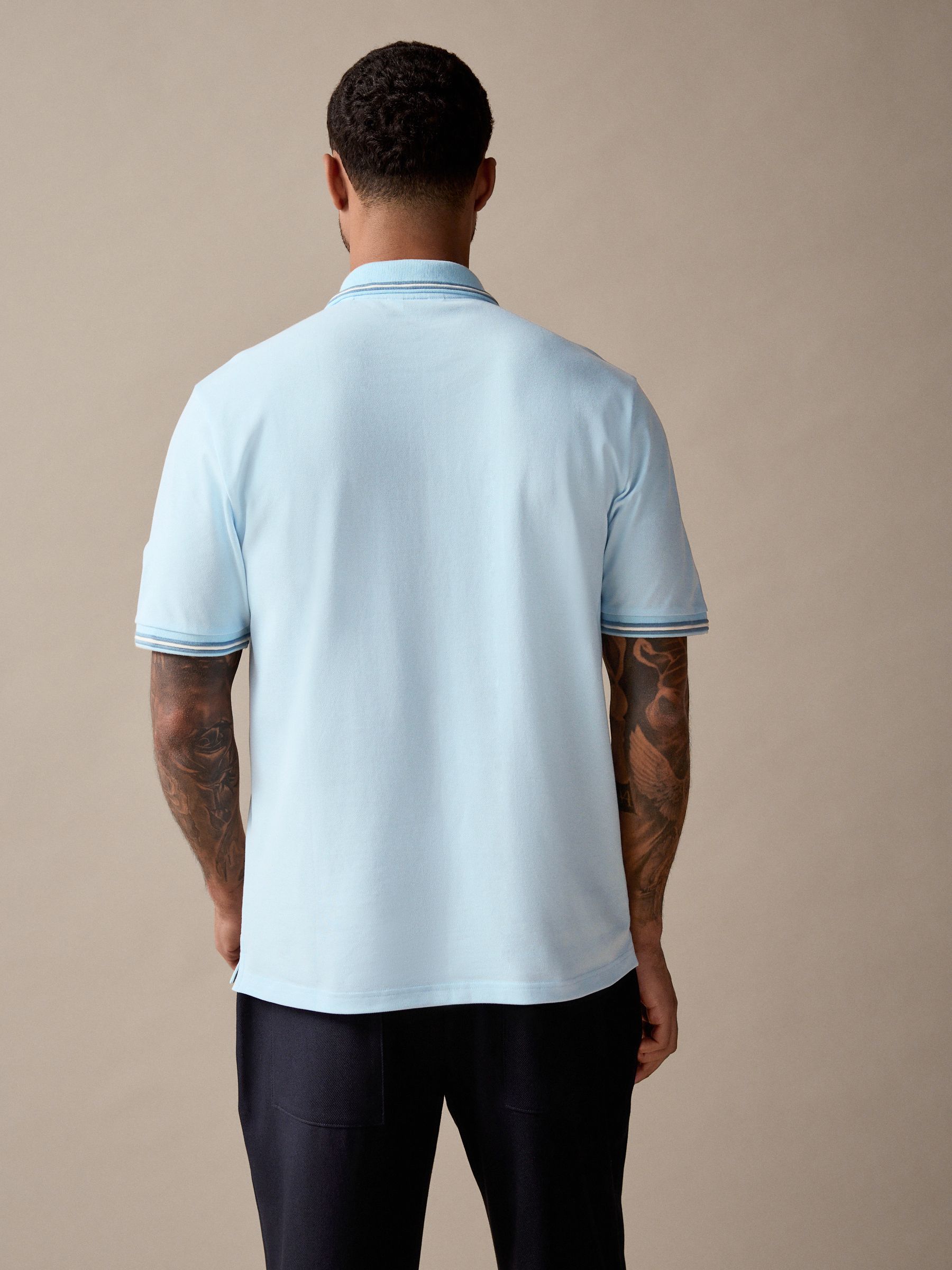 Lichtblauwe ottoman - Regular fit poloshirt met korte mouwen en contrasterende randen