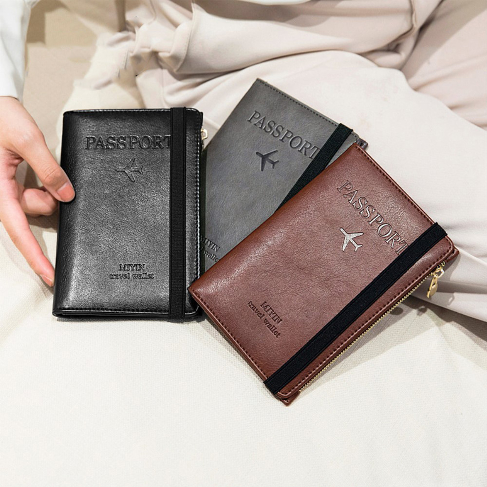 Reisepass Leder Schutzhülle Passport Etui mit Visitenkarten- / SIM Karten- / Geldfach   Reissverschluss (RFID Schutz) - Dunkelbraun