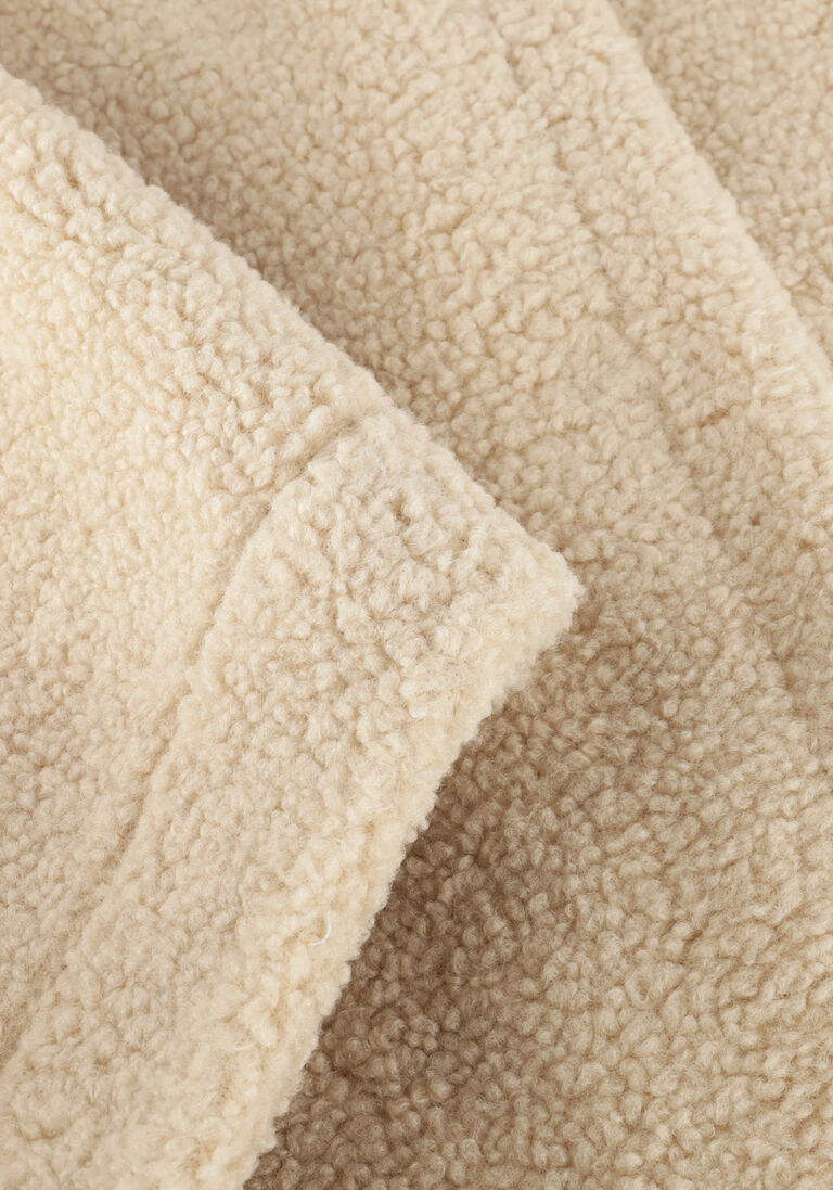 beige knit-ted vest tam