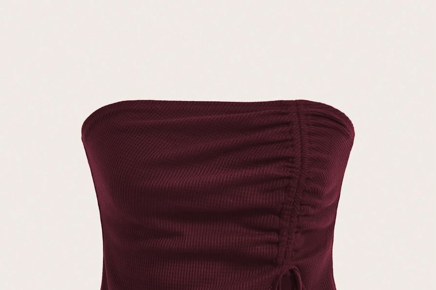 Asiris - Strapless asymmetrische, effen crop top
