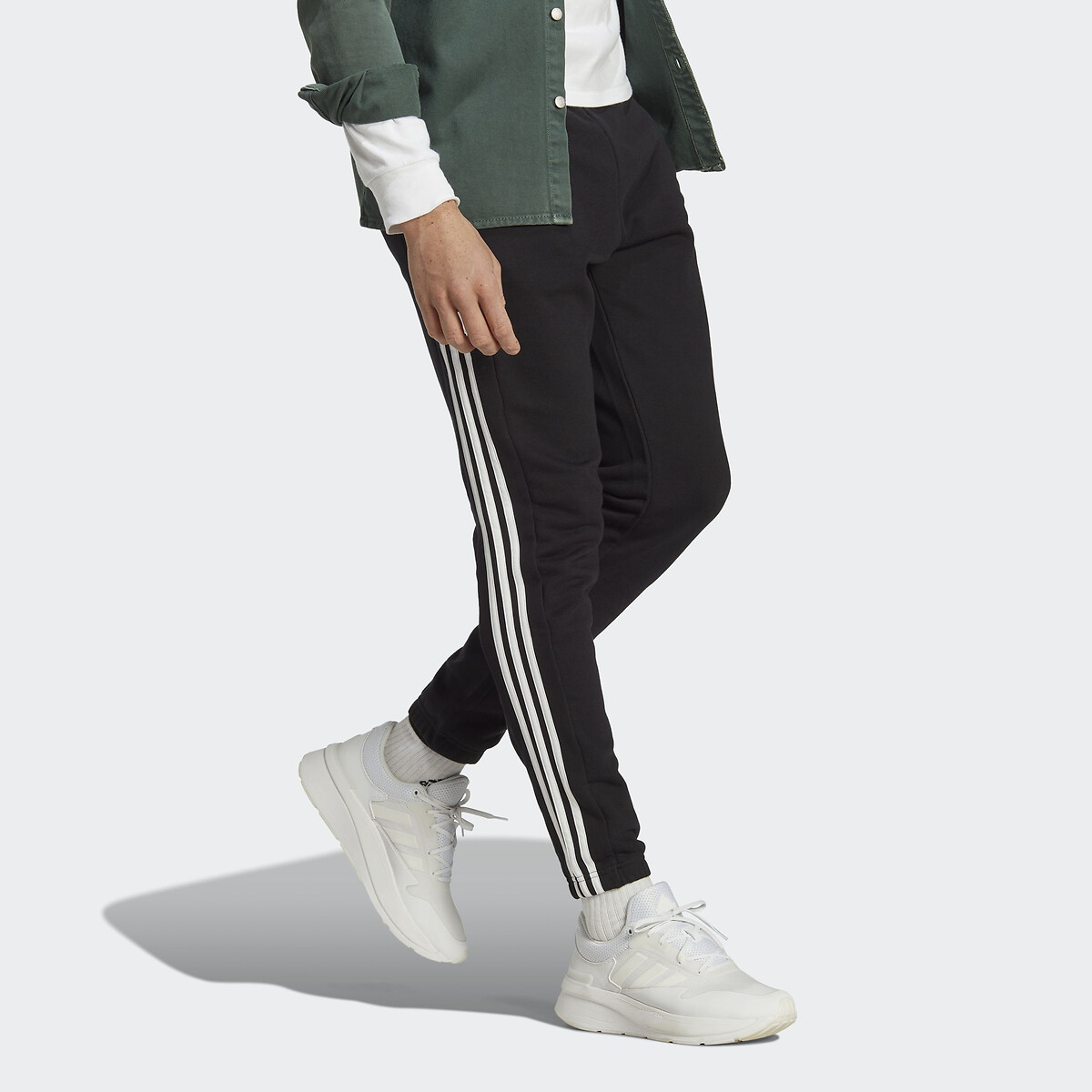 Roupas esportivas Adidas<br>Calças de corrida afuniladas com barra elástica