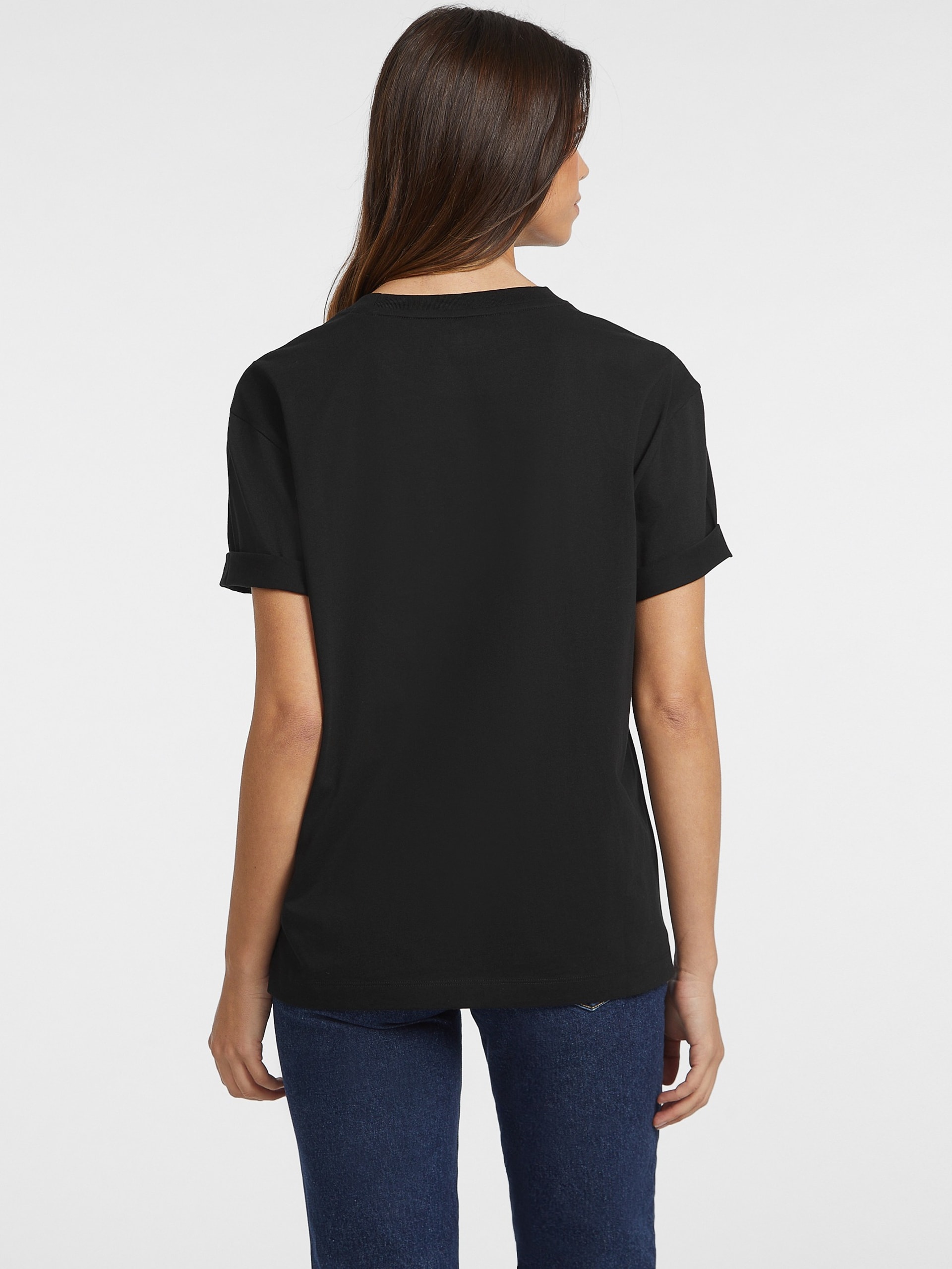 Camiseta oversized com estampas variadas