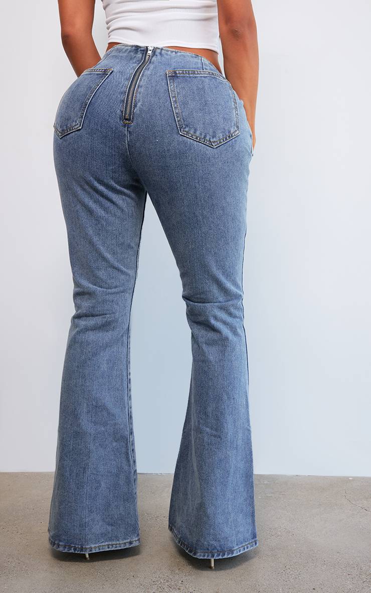 Bleu Jean Évasé En Denim Délavé Avec Ceinture Shape