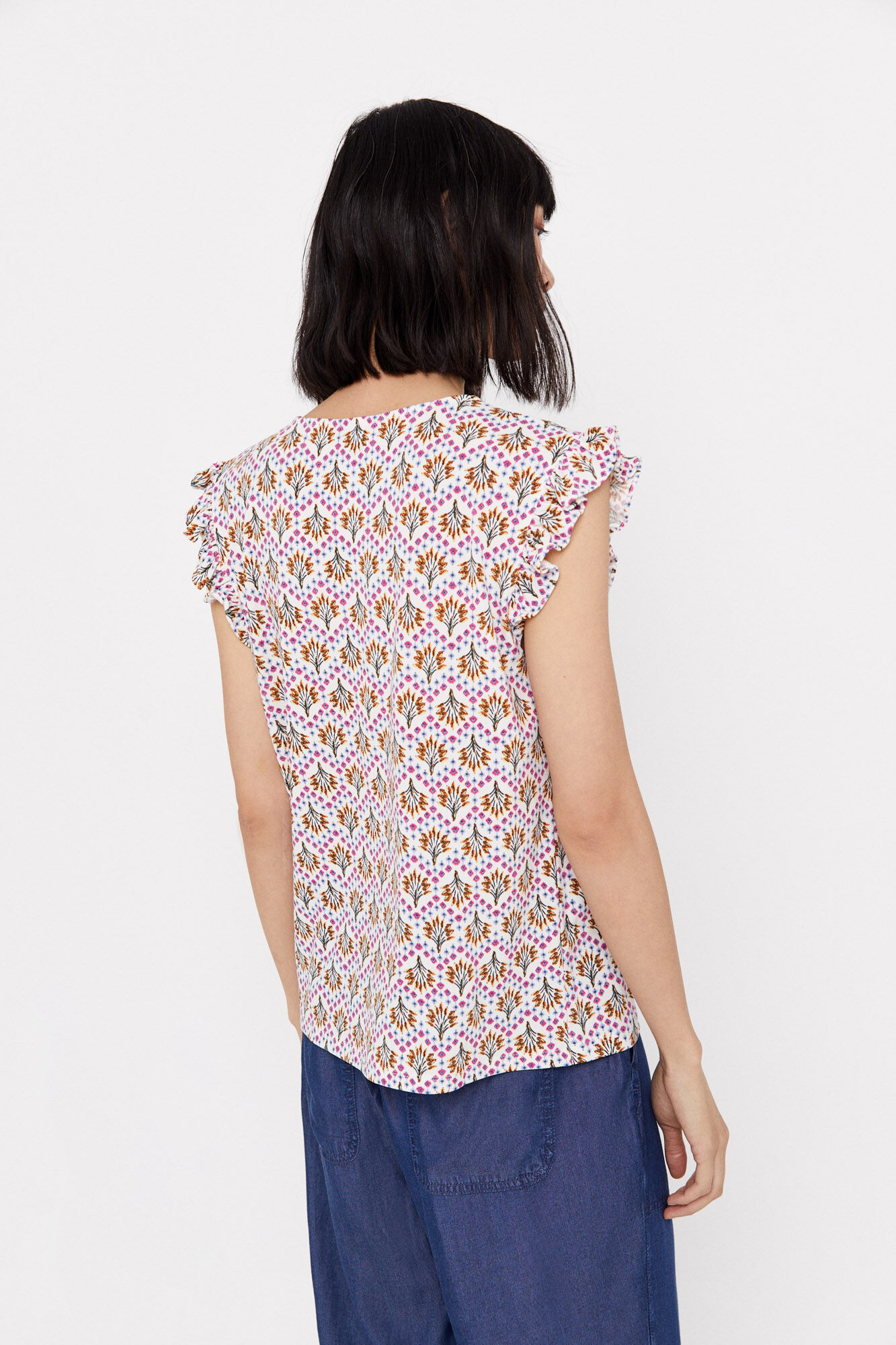 Blusa de malha plissada - Estampa branca