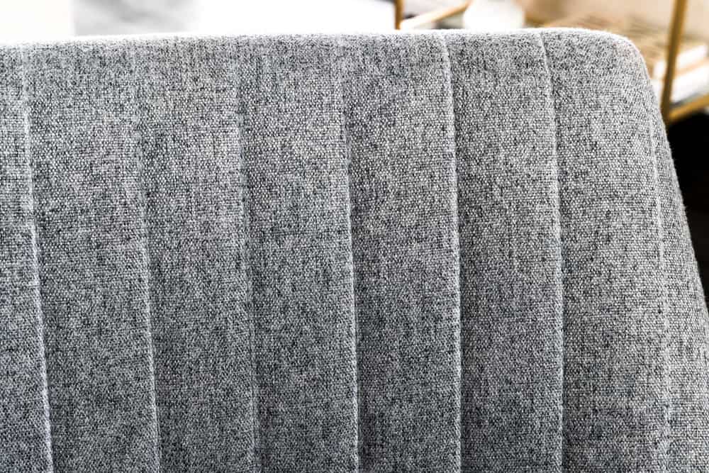 Drehbarer Sessel LOUNGER grau Strukturstoff Metallgestell schwarz