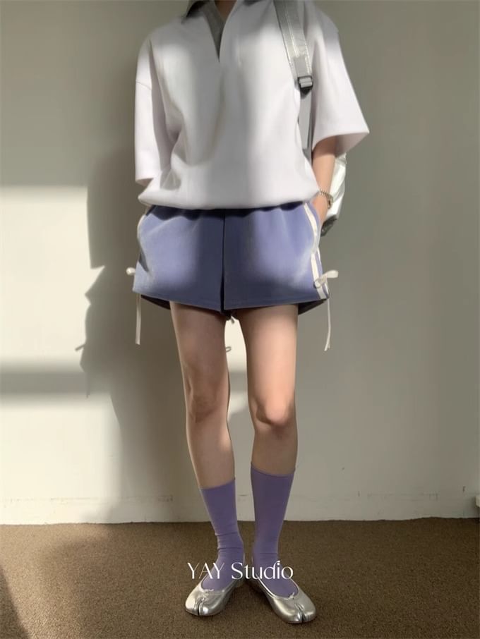 Alfie - Mid Rise gestreepte shorts met strik