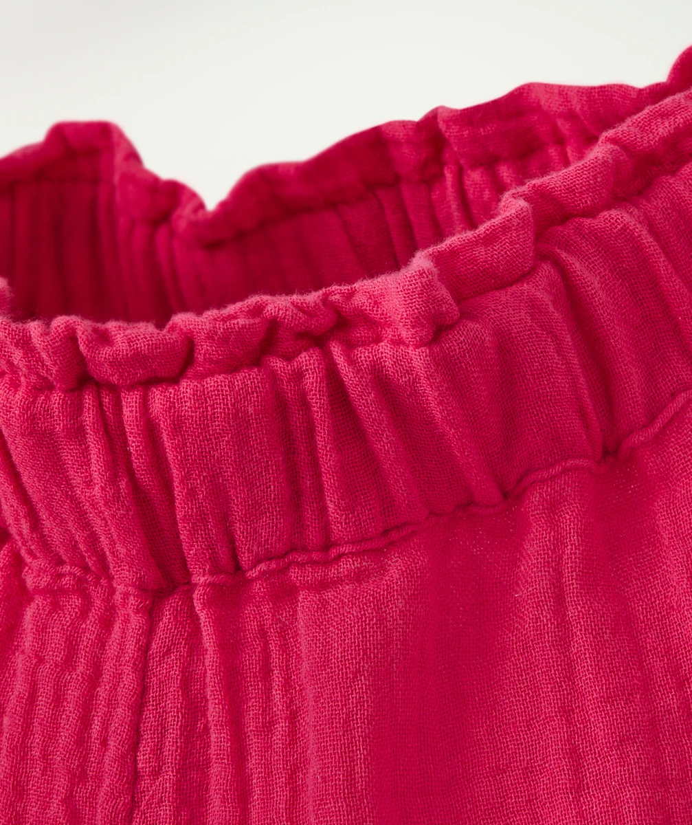 PANTALON FLUIDE ÉVOLUTIF FILLE ROSE EN GAZE DE COTON