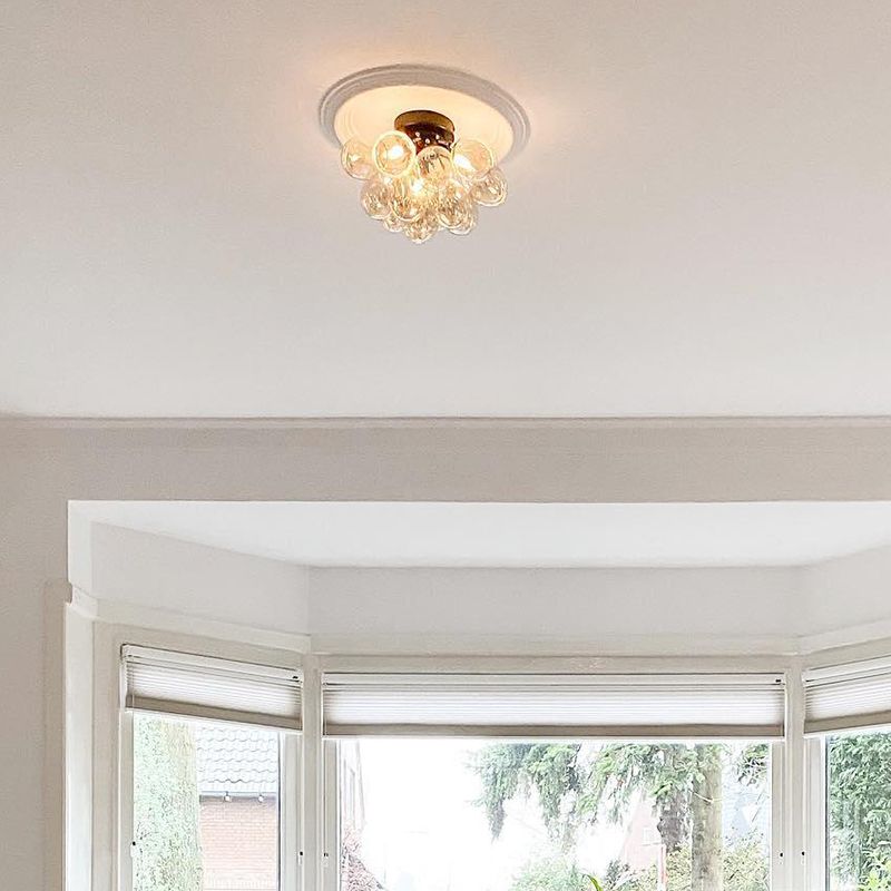 Design plafondlamp zwart met amber glas 3-lichts - Uvas